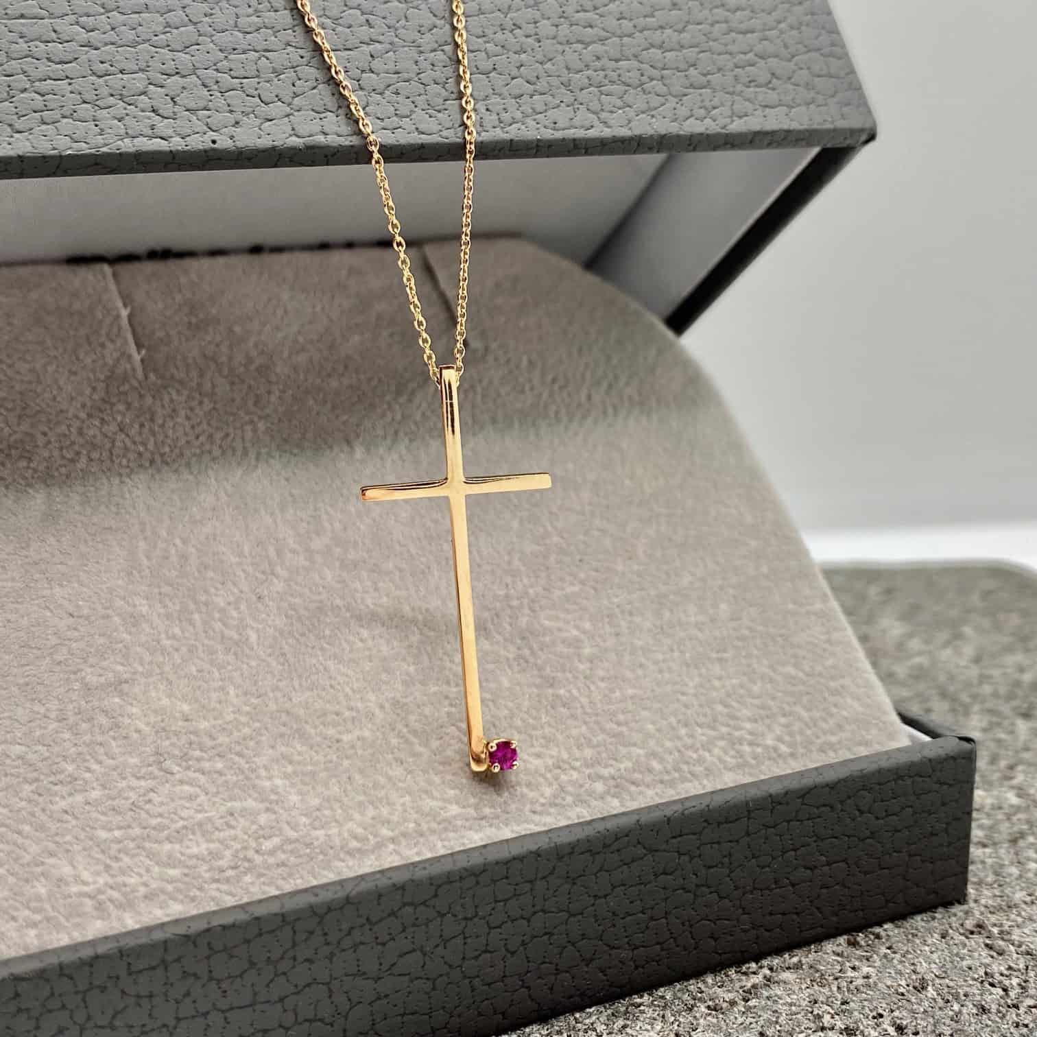 Minimal cross pendant with one ruby — Melina Fachidis (2)
