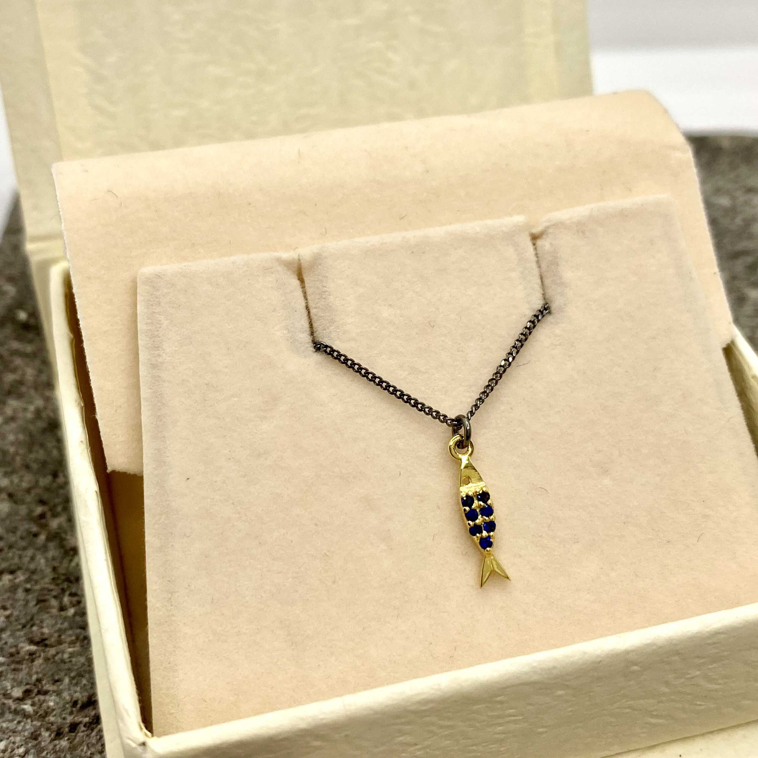 Golden fish pendant with blue sapphires — Melina Fachidis (2)
