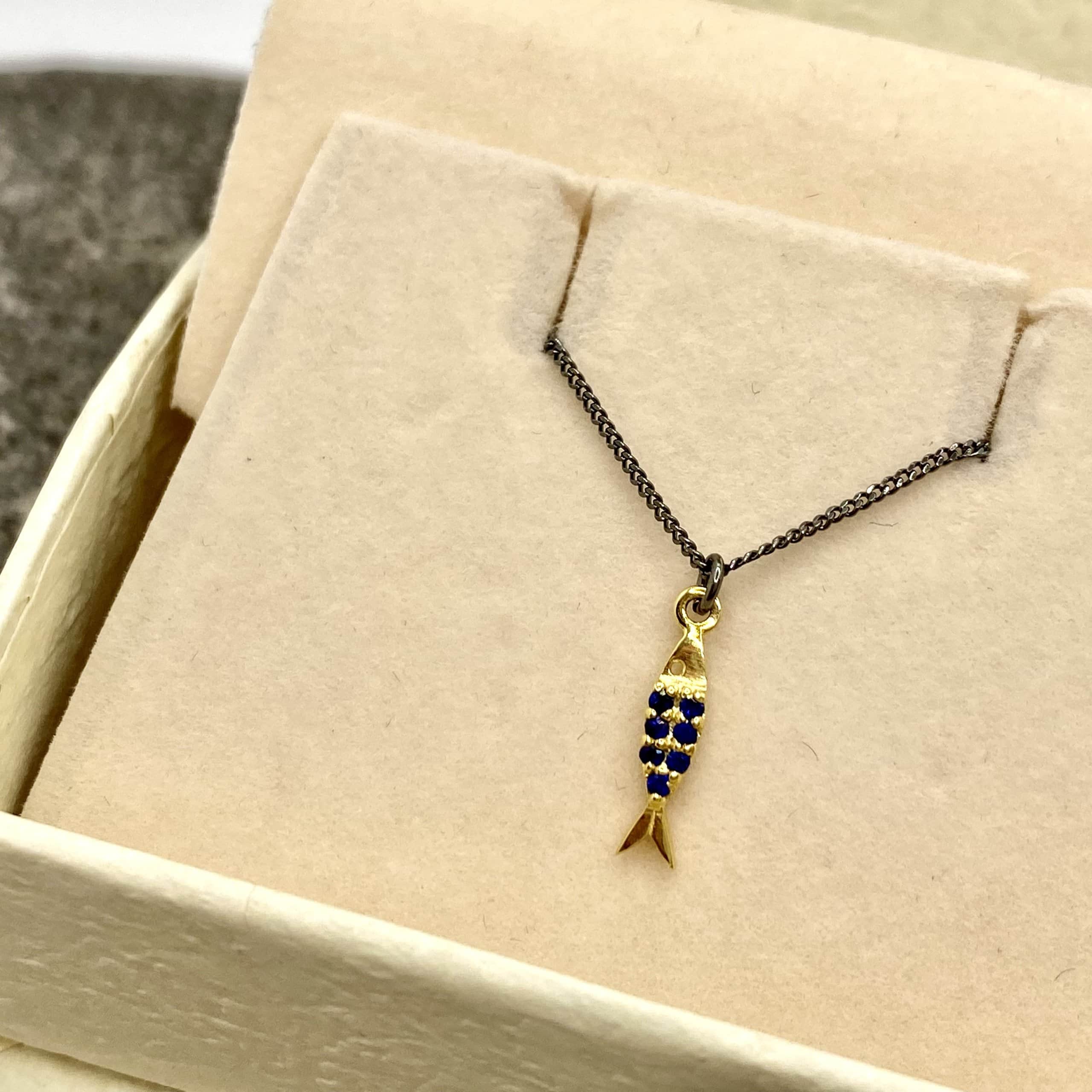 Golden fish pendant with blue sapphires — Melina Fachidis (3)