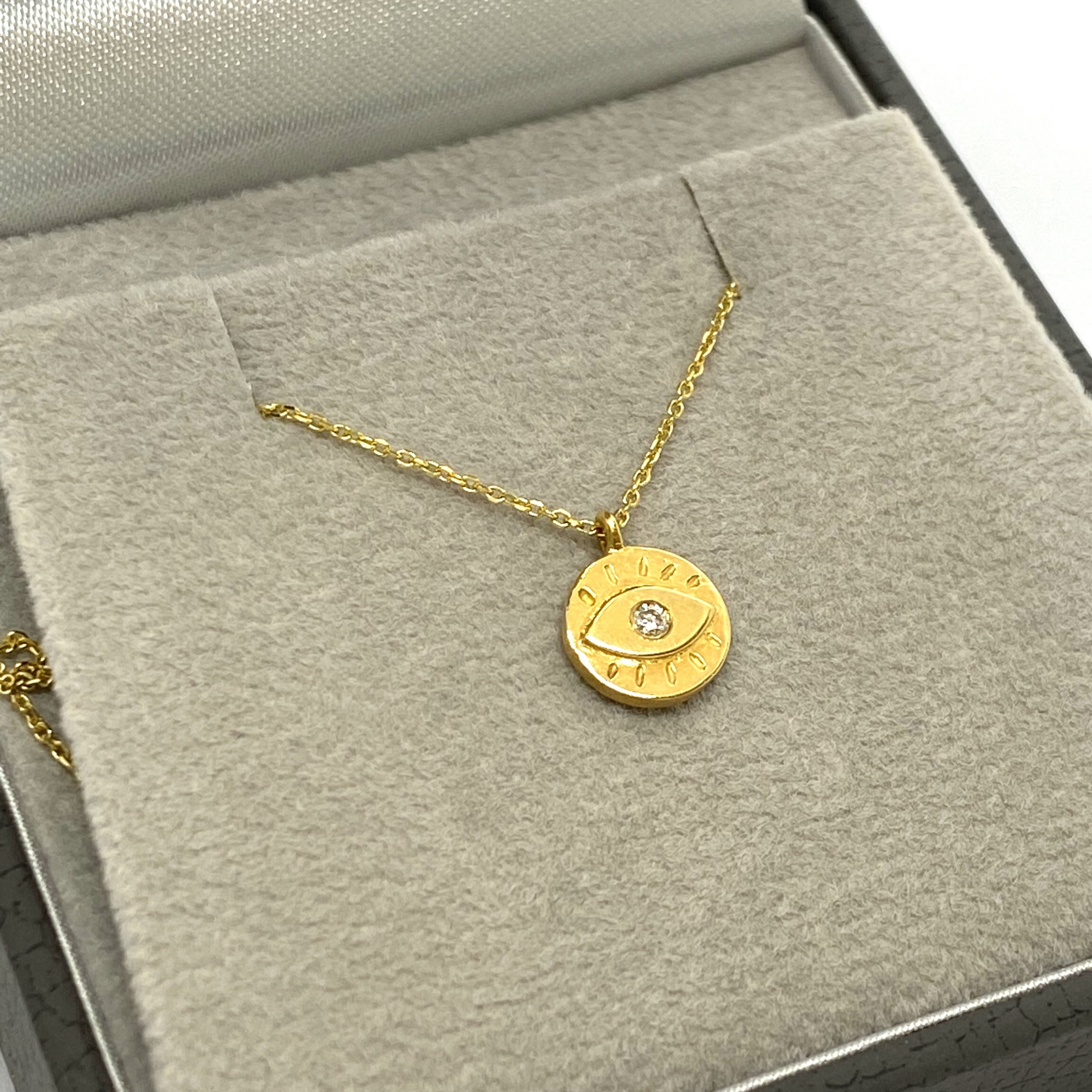 Small golden eye pendant — Melina Fachidis (3)