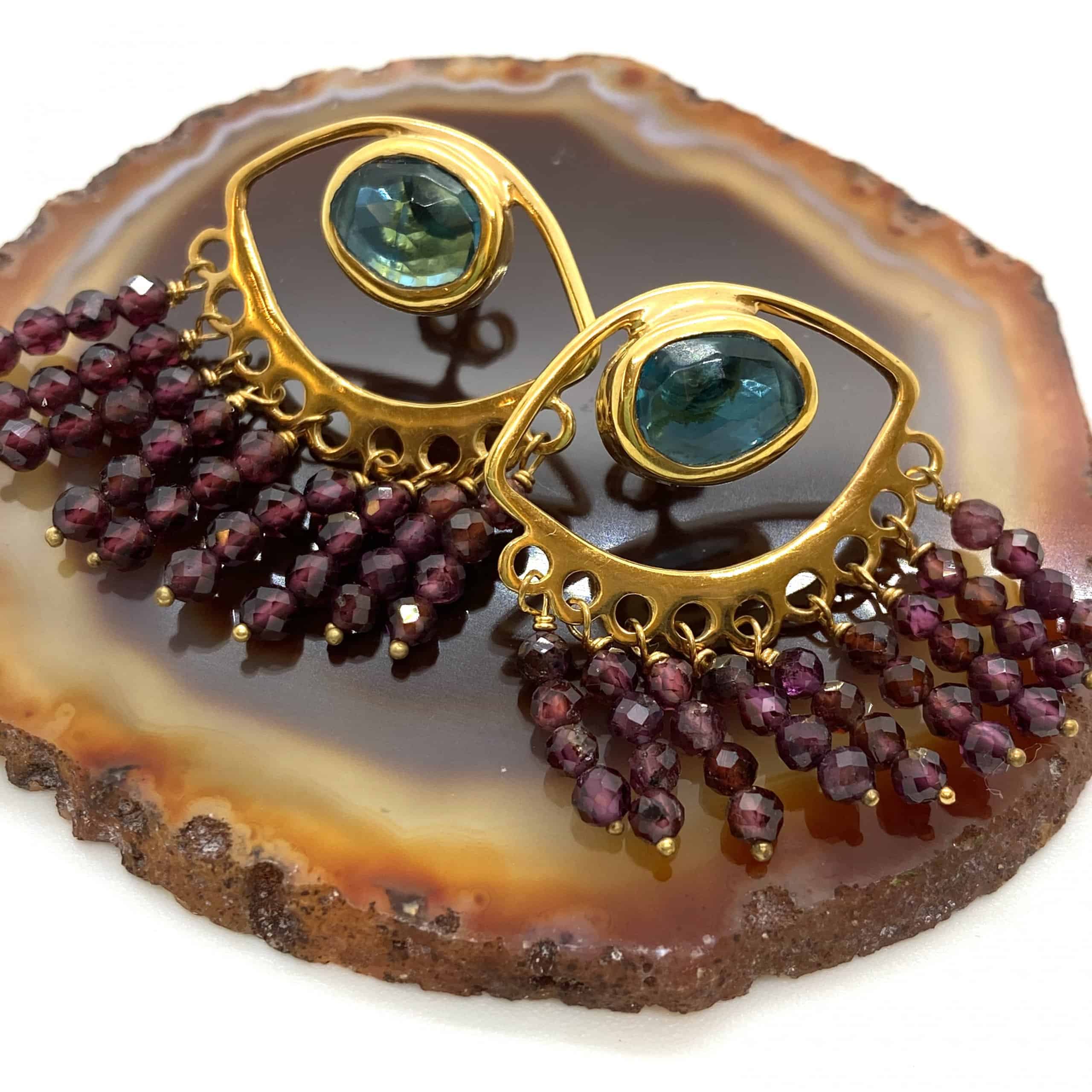 Eye shaped blue topaz and garnet earrings — Melina Fachidis (3)