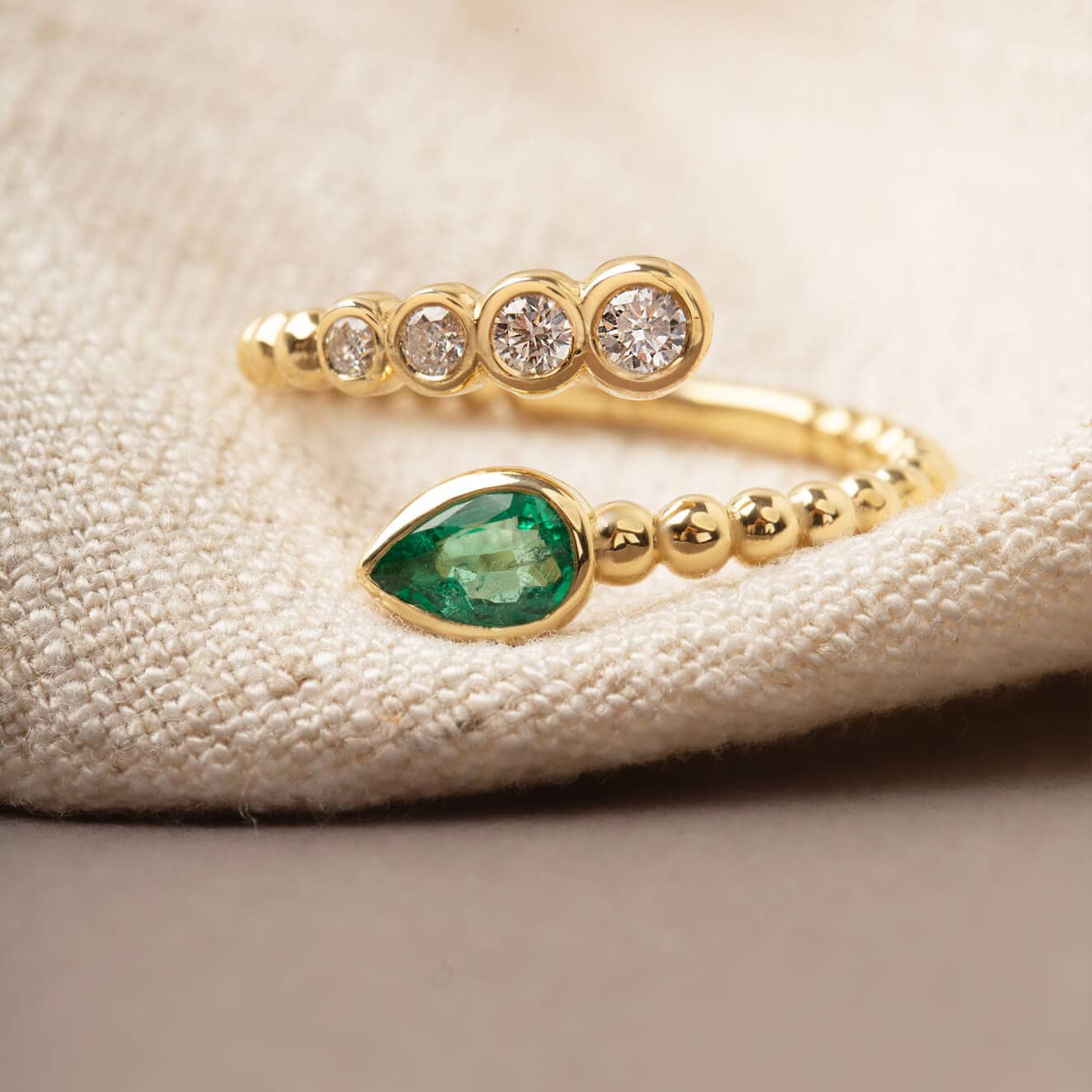 Criss cross ring with emerald diamonds — Melina Fachidis (2)