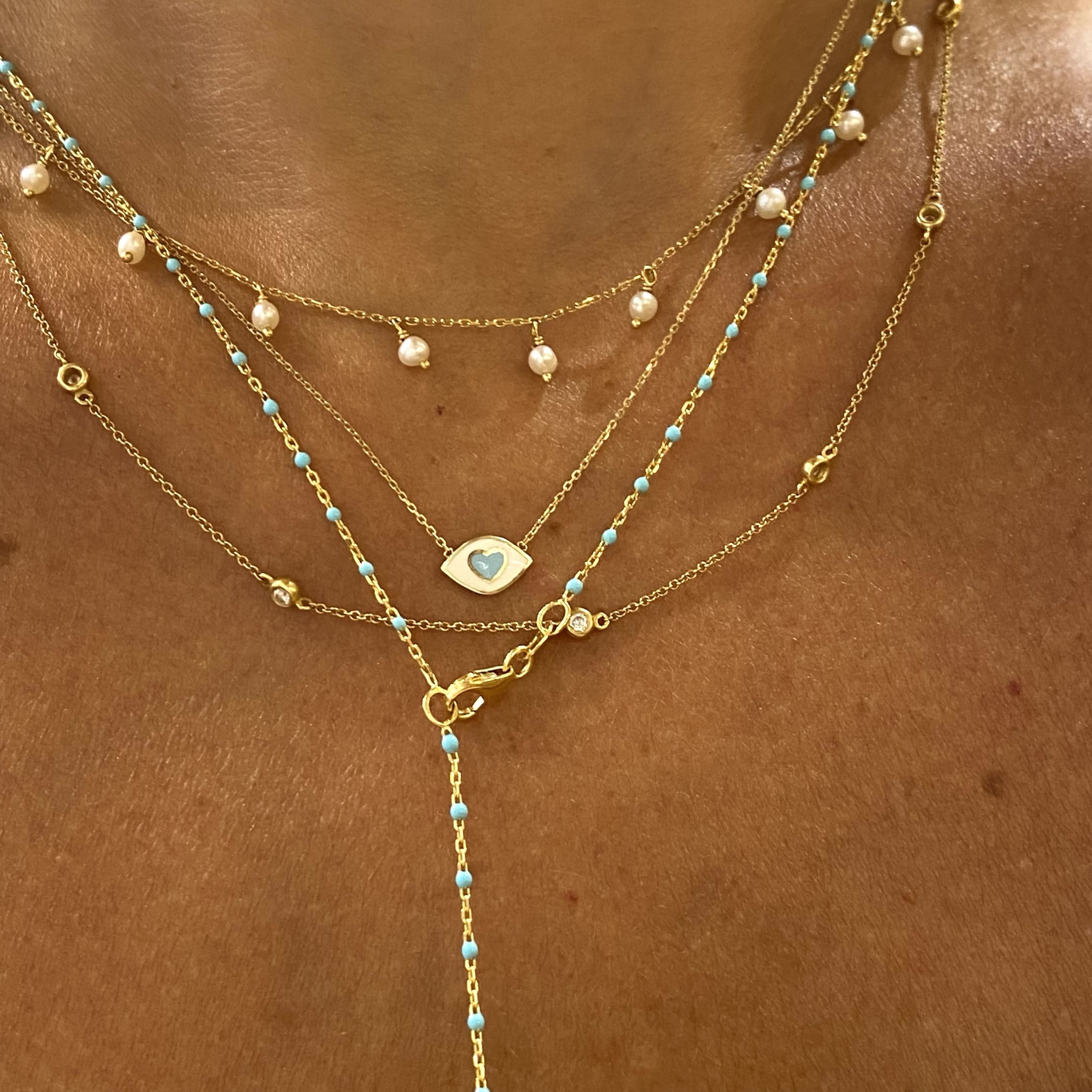 Tiny baby blue heart pendant — Melina Fachidis (4)