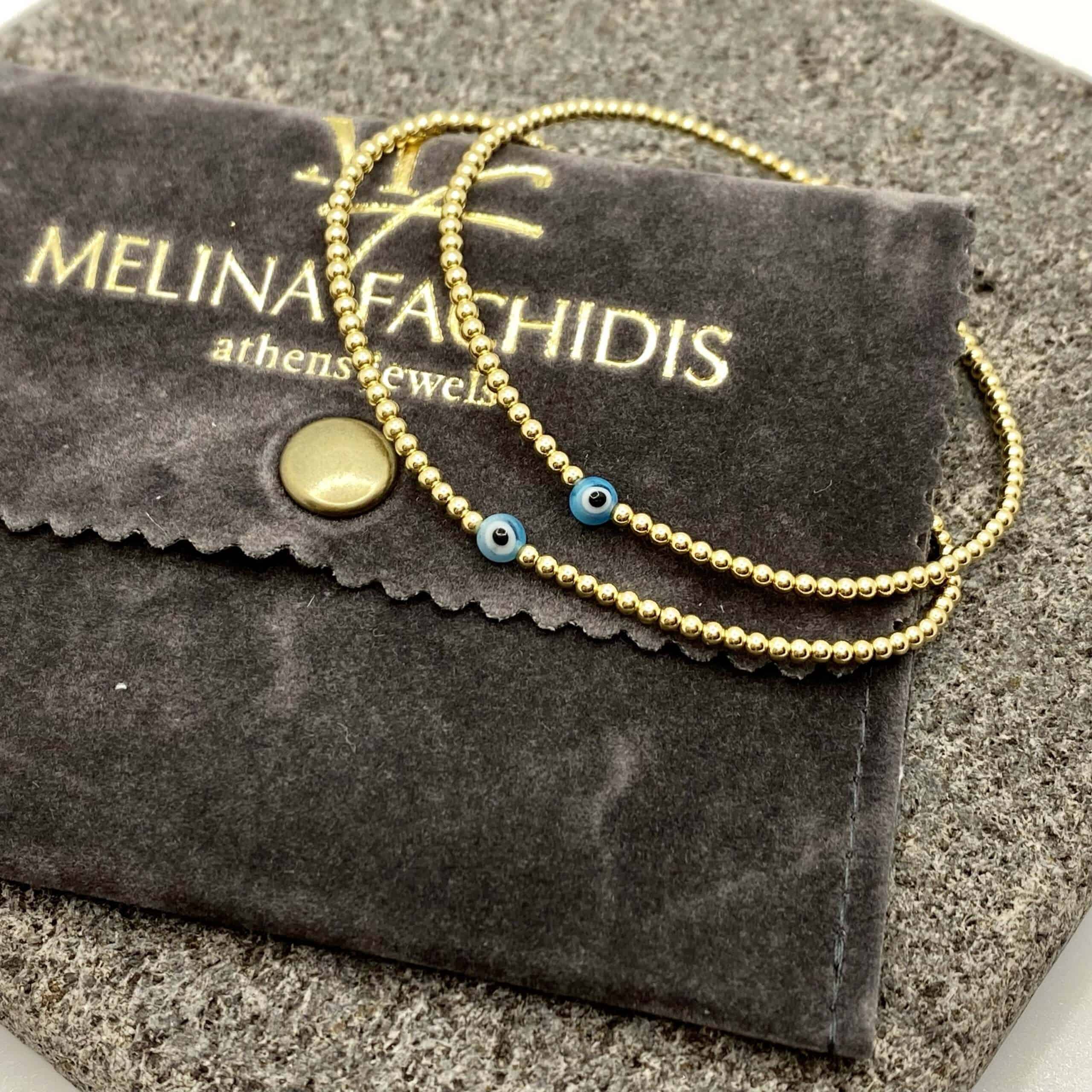 Ours eye and golden bracelet — Melina Fachidis (3)