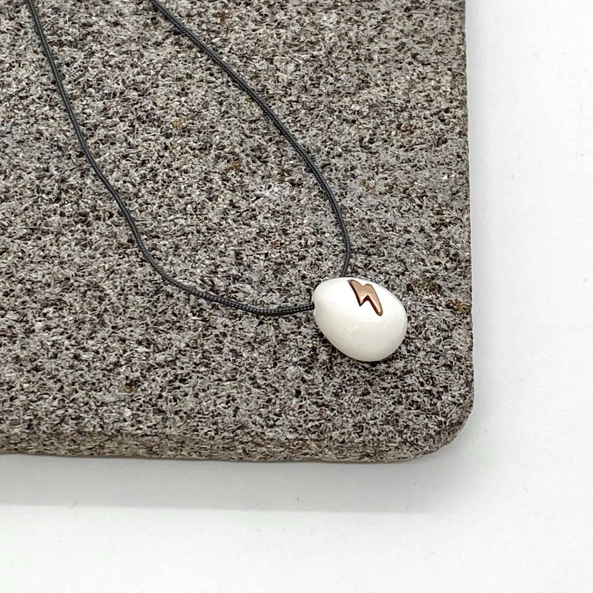 White egg shaped thunder pendant — Melina Fachidis (3)
